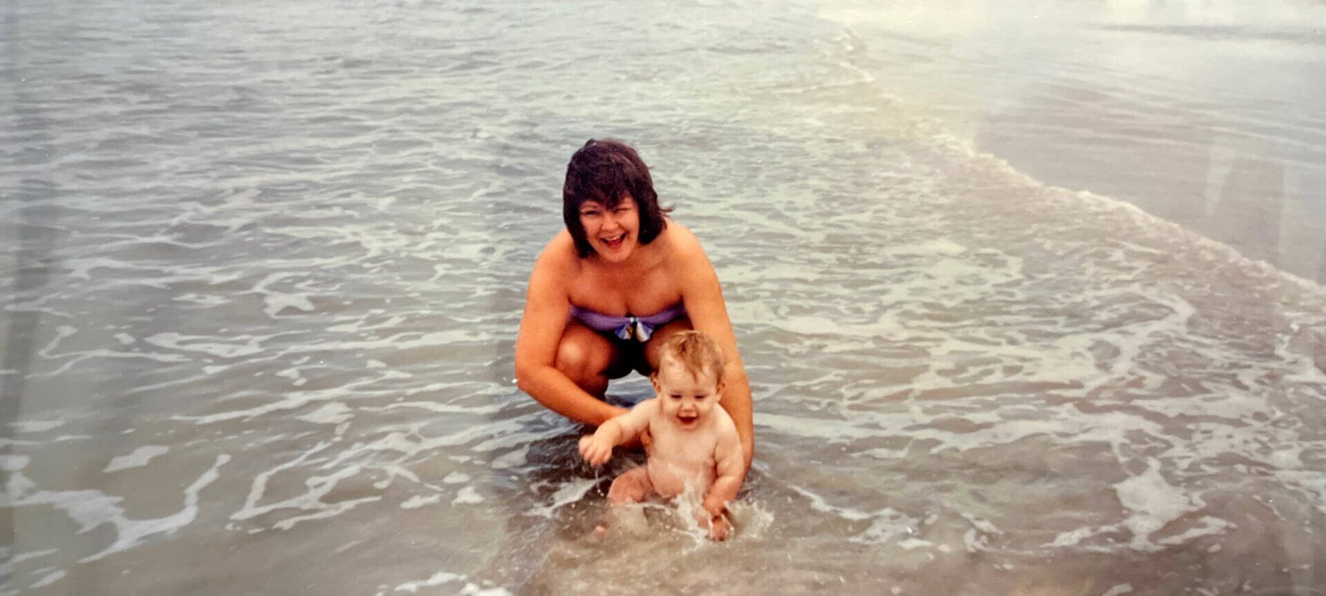 Brad Lyn as a baby with mother